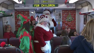 Santas Train delivers more than smiles this holiday season [upl. by Renruojos361]